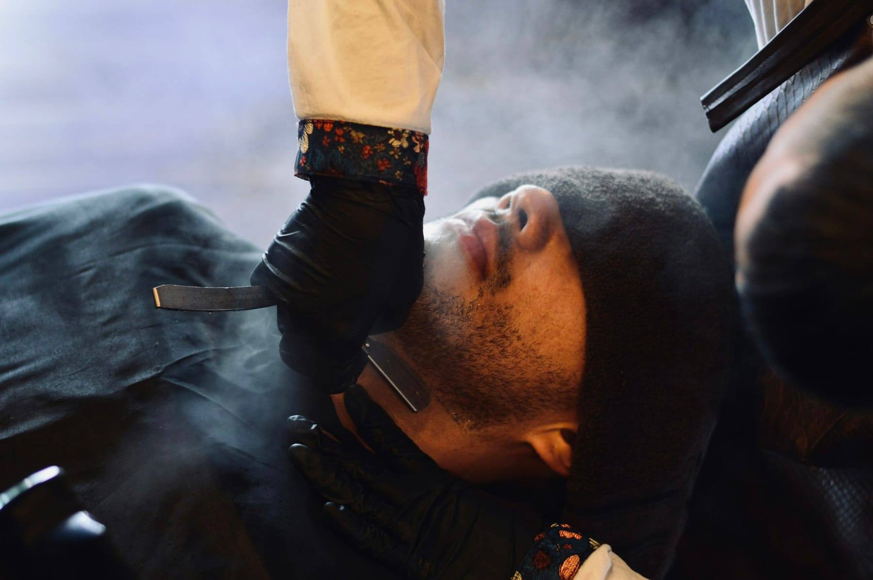 Beard being sculpted in warm low light
