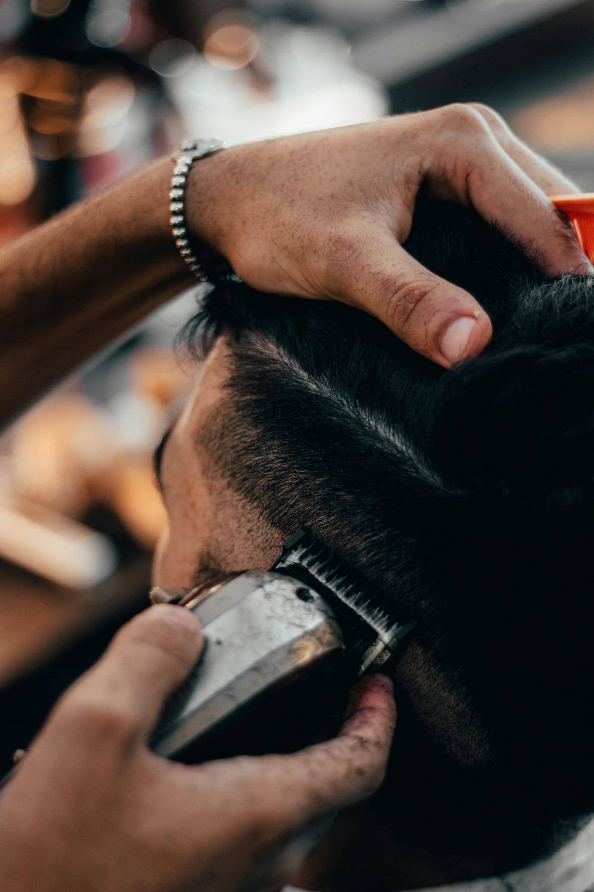 Close-up of clipper work on the back of a client’s head