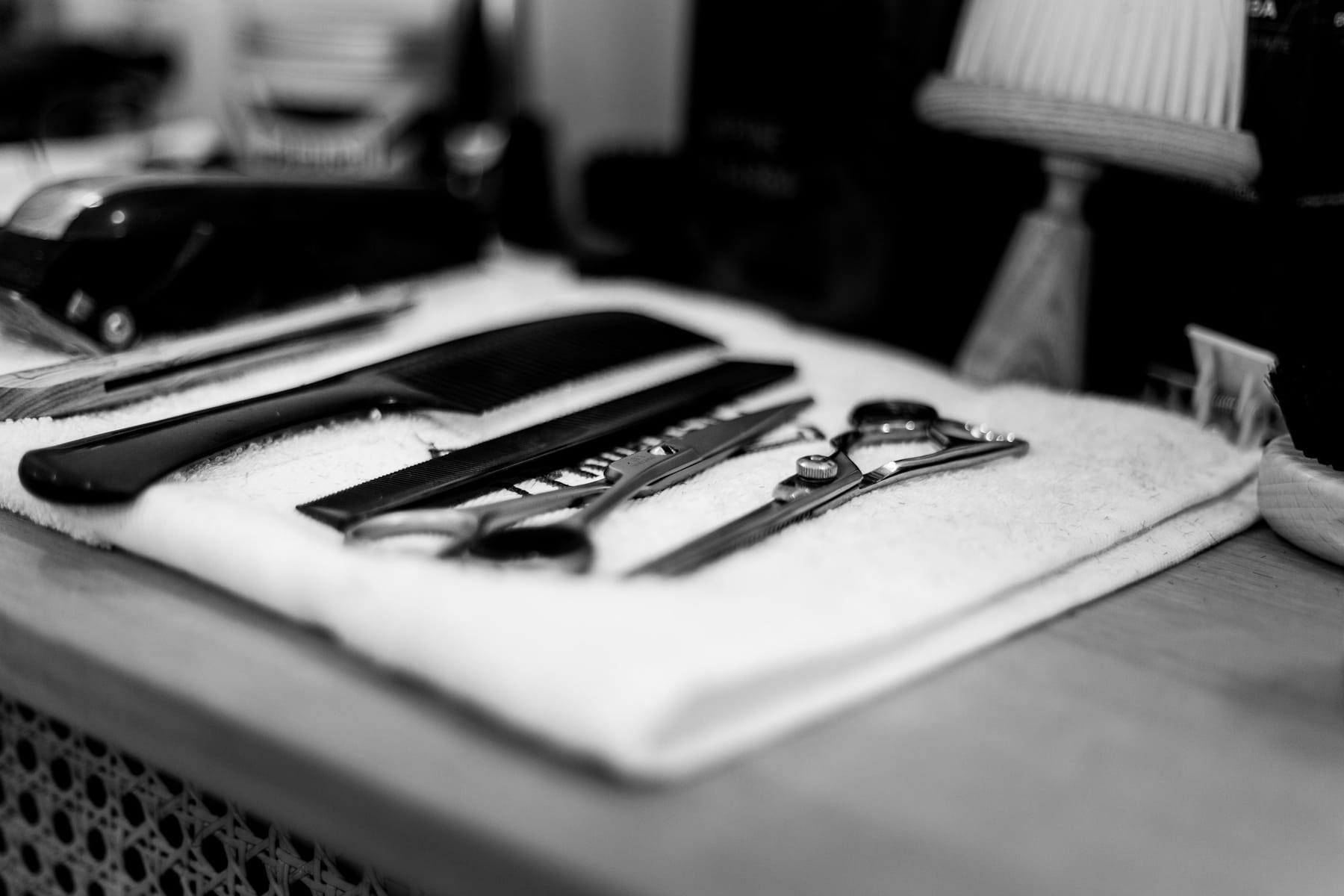 Barber tools on a towel, black and white